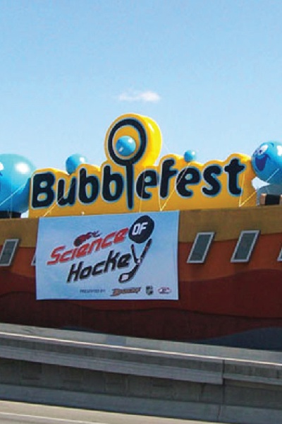 Custom Bubblefest inflatable sign displayed above an event entrance for science festivals, family attractions, and promotional events. Custom Bubblefest inflatable sign displayed above an event entrance for science festivals, family attractions, and promotional events.