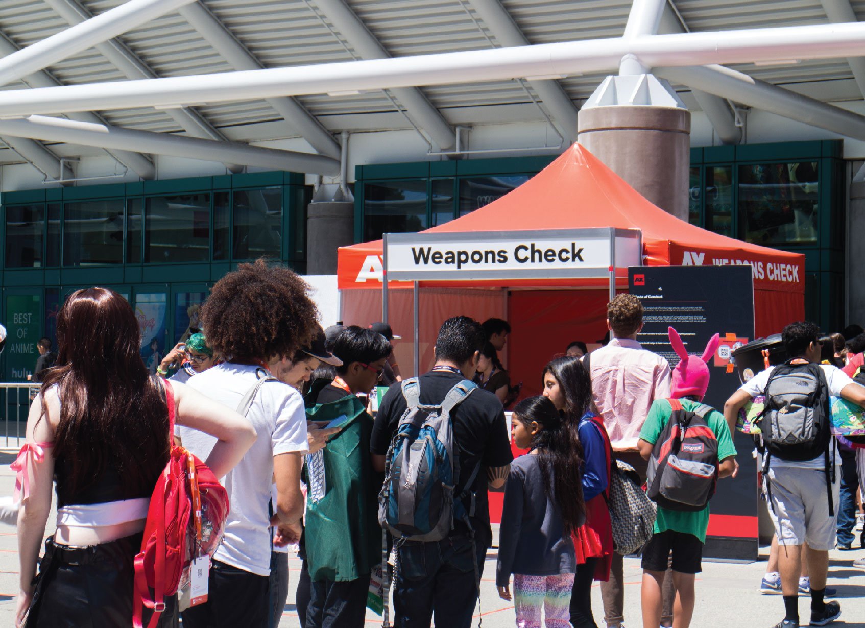 10x10 custom canopy tent with sign and cosplayers in front of convention center for Anime Expo