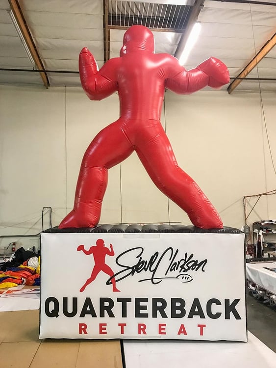 steve clarkson quarterback retreat custom sports inflatable