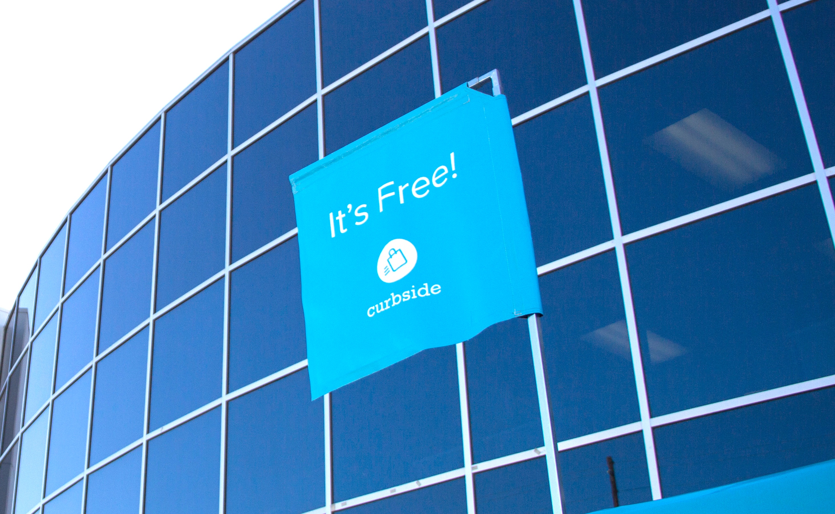 Canopy flag covers in print for the Curbside Corporation