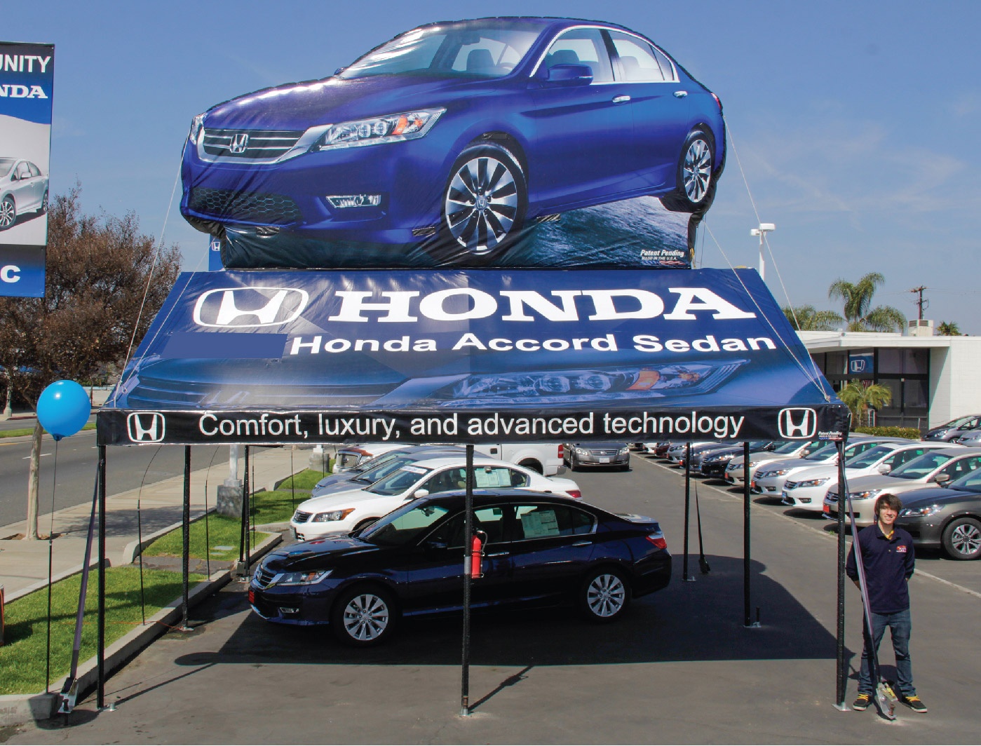 Honda Accord 20x20 Frame Tent with graphics printed on the tent with Honda slogans