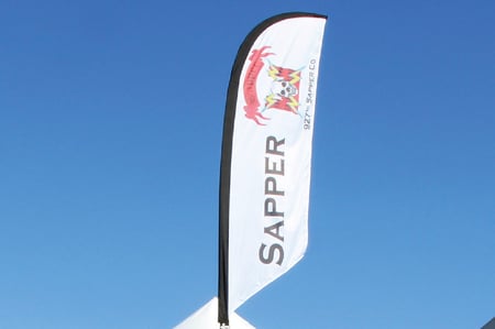 custom printed advertising flag mounted on tent frame