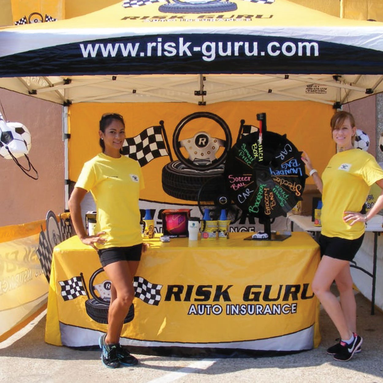 risk guru canopy flag tent with printed tent top, full wall, table cover, and short walls