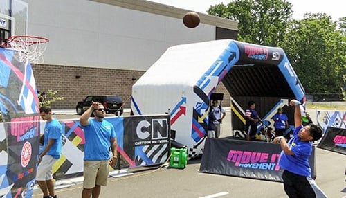 Cartoon Network Custom Printed Inflatable Tunnel Structure with kids playing around it