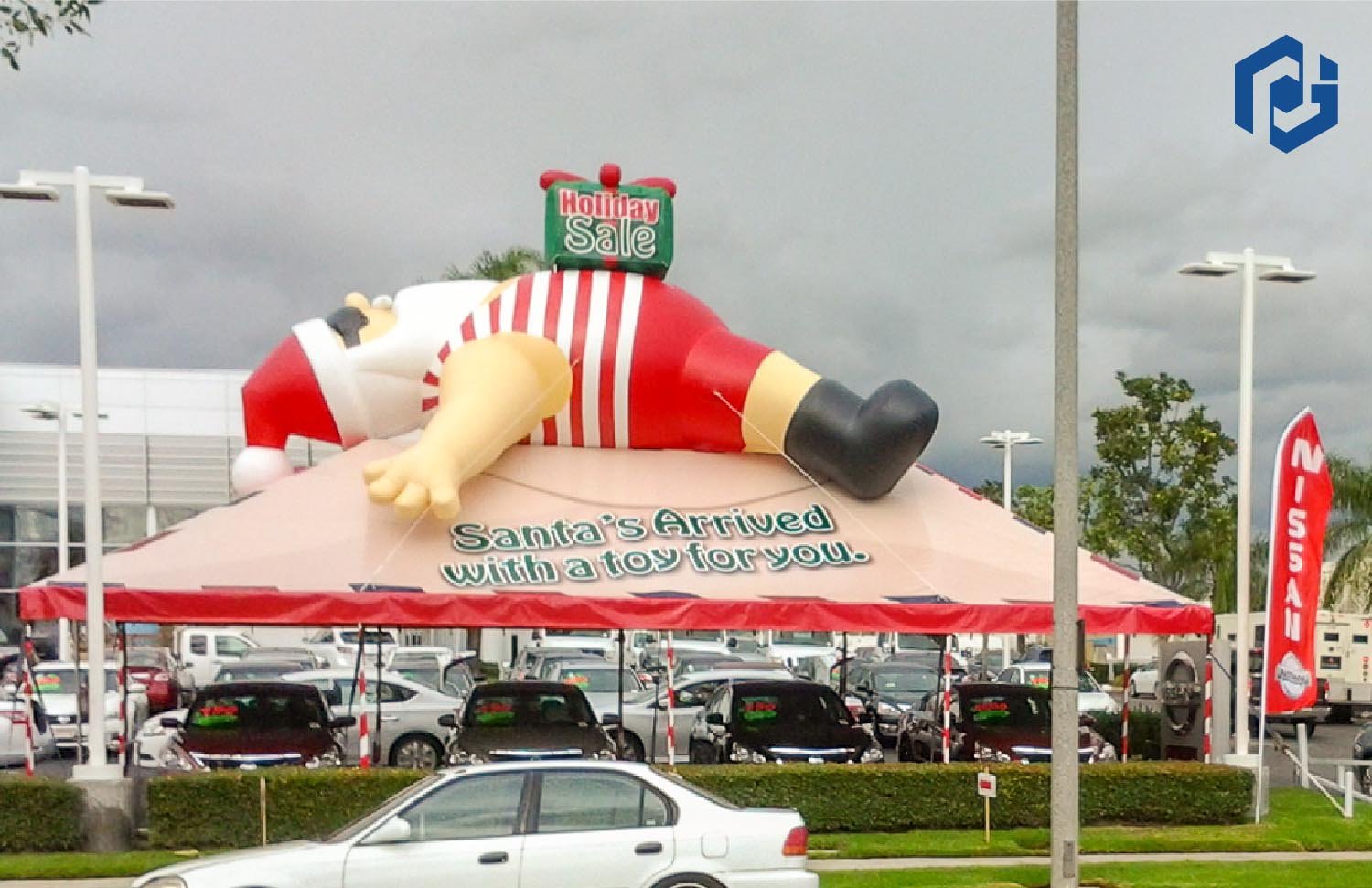 Giant Inflatable Santa Claus on a Tent Giant Inflatable Santa Claus on a Tent