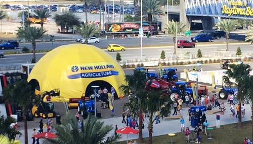 Yellow inflatable dome with a printed cover for New Holland Agriculture