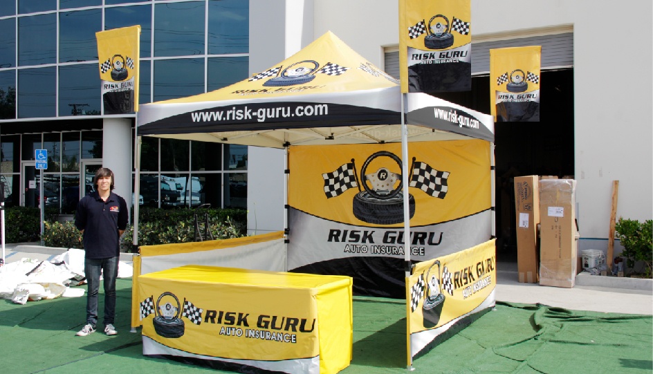 Canopy flag package with printed tent top, custom canopy flags, printed full wall, table cover, and short side walls