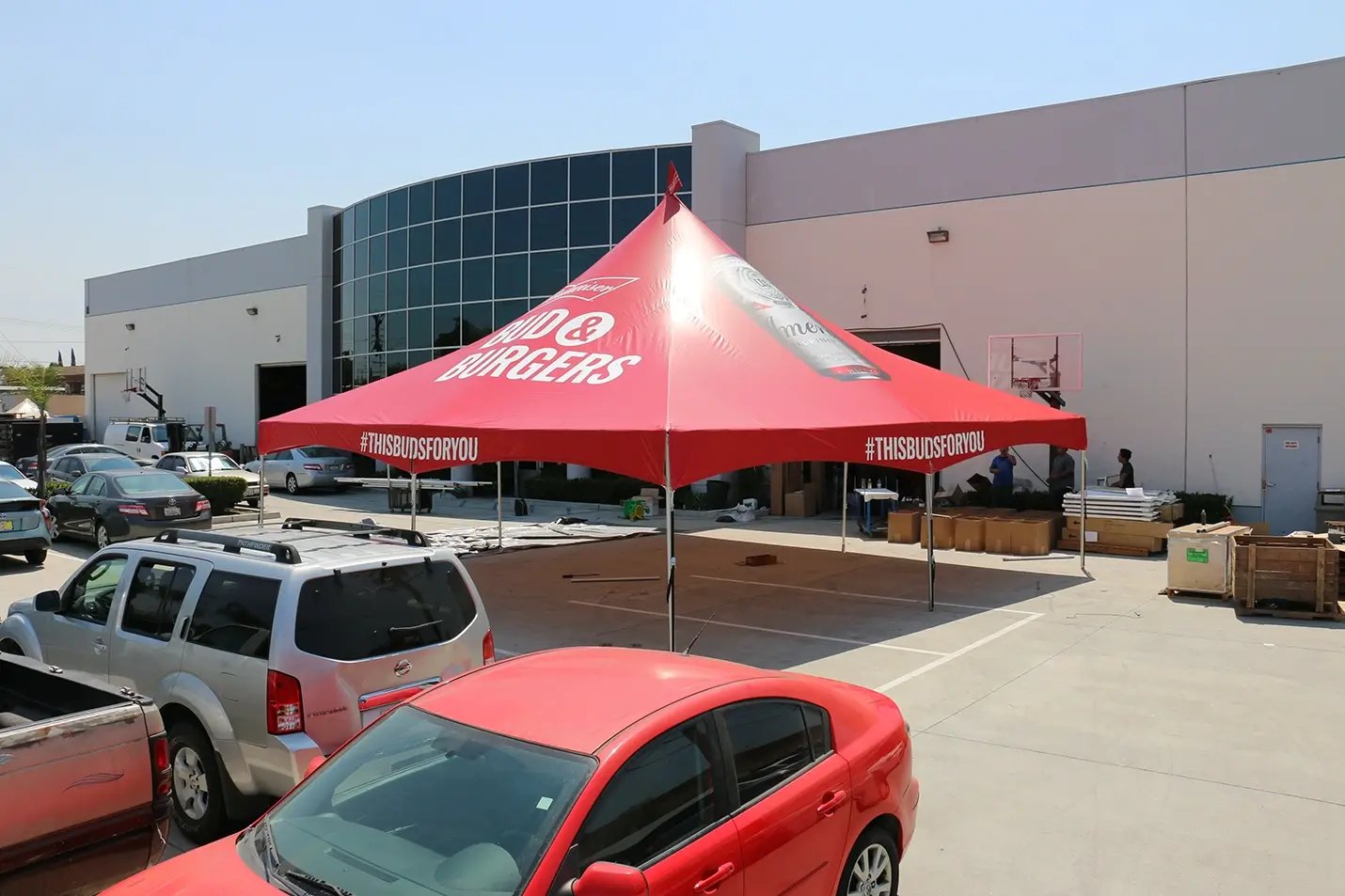 Custom high peak tent for outdoor events with branded canopy top, ideal for festivals, tastings, and promotional displays