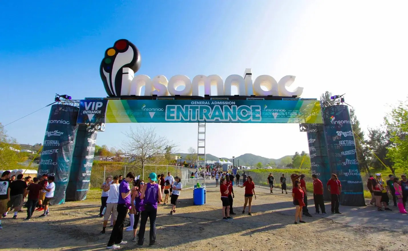 Custom inflatable event entrance arch with Insomniac branding and oversized entrance banner for music festival admissions Custom inflatable event entrance arch with Insomniac branding and oversized entrance banner for music festival admissions