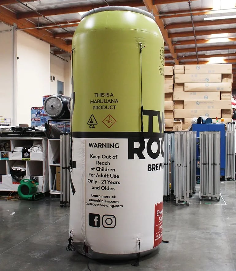 Inflatable can replica for Two Roots Brewing with full-wrap print used for promotional event displays