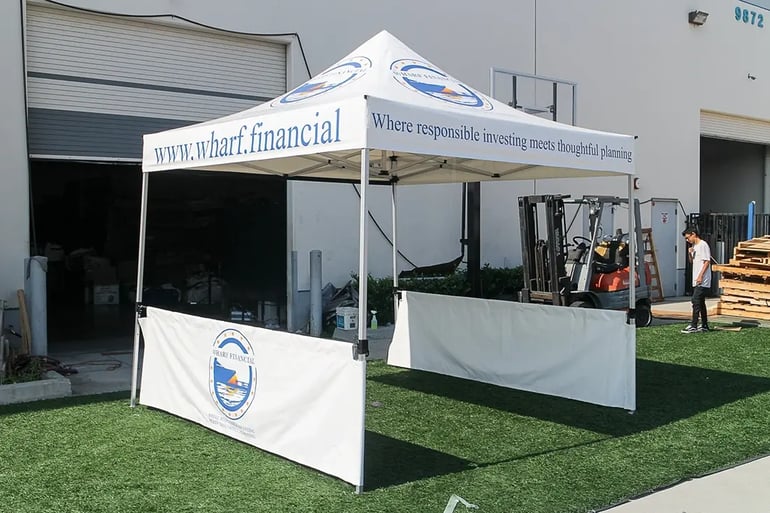Custom pop up canopy with printed valance text, roof logos, and short side wall branding panel